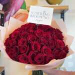 50 PINK ROSES +$128.00